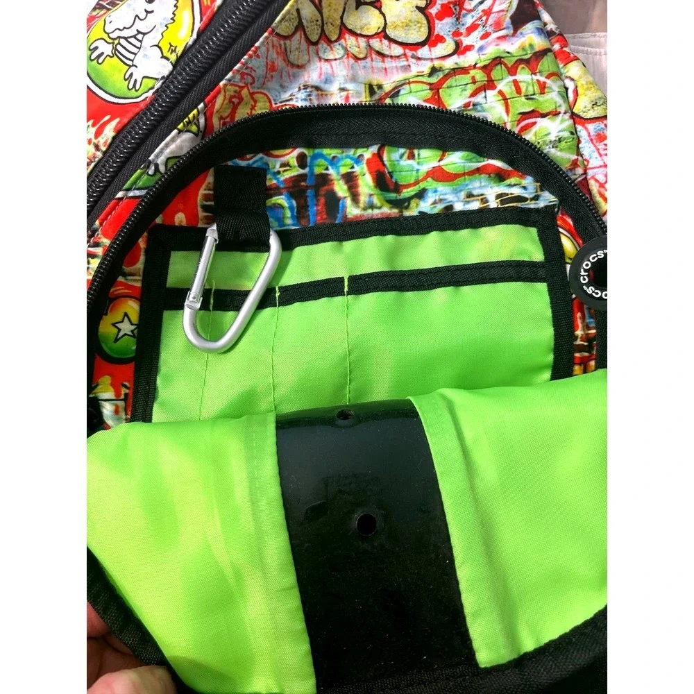Crocs Graffiti Print Sling  Crossbody Backpack Neon Green Interior Multi-Color